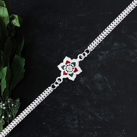 Silver Lotus Rakhi With Red-green Enamel Chain Strap