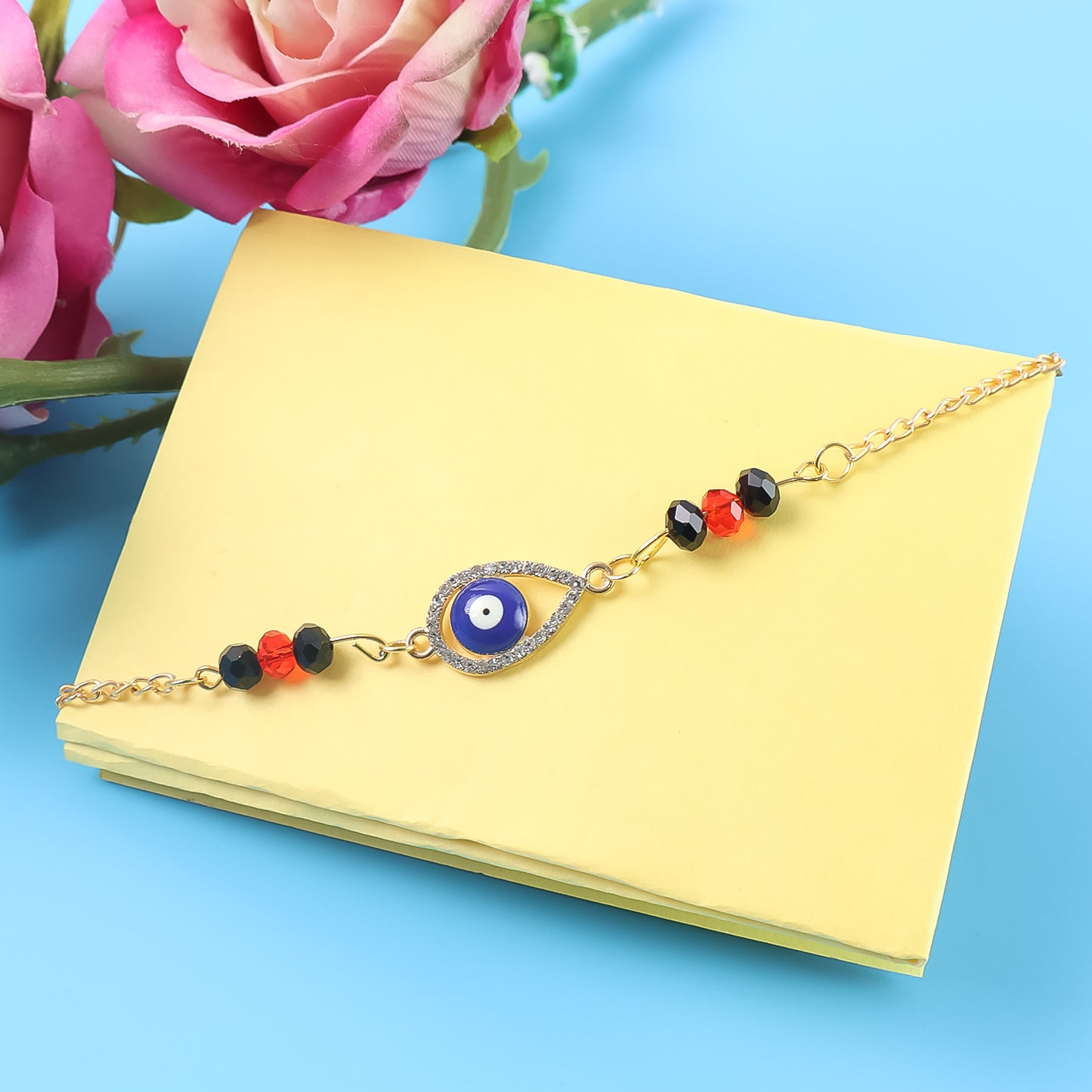 Royal Nazar Rakhi  Premium Evil Eye Protection Thread With Ornate Beads  Golden Chain